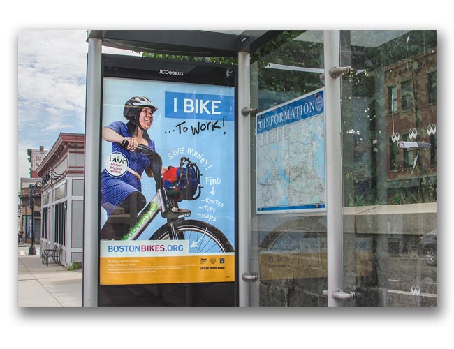 Photo of Let's Get Healthy Boston bike campaign bus shelter poster